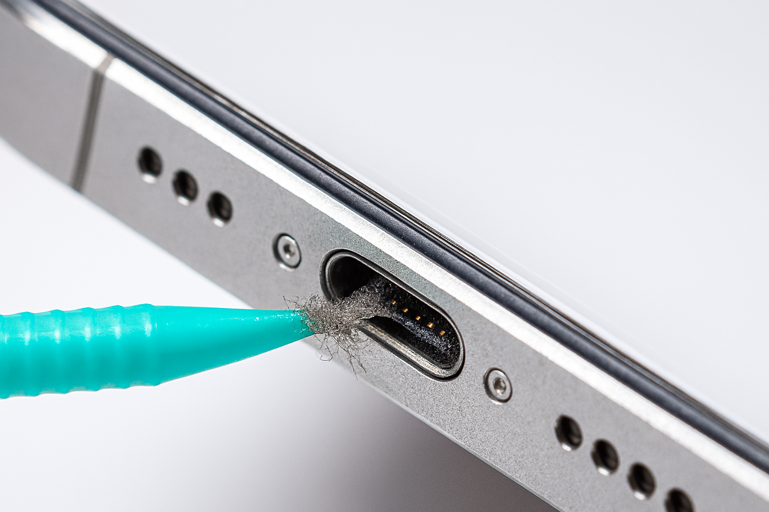 cleaning phone charging port with plastic toothpick